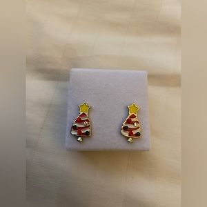 Christina’s tree with yellow star earrings